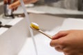 Unrecognizable person hands with eco friendly toothbrush