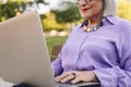 unrecognizable senior woman typing on laptop Royalty Free Stock Photo