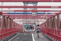 Unrecognizable sporty recreational male runner funning at Williamsburg bridgein New York City, USA Royalty Free Stock Photo