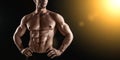 Unrecognizable Strong Athletic Sexy Muscular Man on Black Background Royalty Free Stock Photo