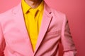 Unrecognizable stylish man unknown guy male model in trendy pink suit jacket with yellow shirt tie fashion store clothes