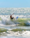 Unrecognizable surfer surf a wave Royalty Free Stock Photo