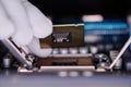 Unrecognizable Technician Installing New CPU Into Computer Royalty Free Stock Photo