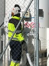 Unrecognizable technician with work clothes fill with liquid nitrogen with Nitrogen storage tank at new factory. Vertical view Royalty Free Stock Photo