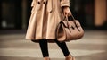 Unrecognizable Trendy Women in Beige Coat and Jeans with Fashionable Bag - Fashion Close Up. Generative AI