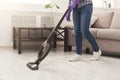 Unrecognizable woman cleaning house with vacuum cleaner Royalty Free Stock Photo