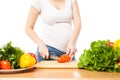 Unrecognizable woman cutting tomato Royalty Free Stock Photo