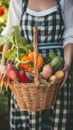 Unrecognizable woman holding a basket full of vegetables
