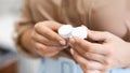 Unrecognizable woman holding contact eye lenses container Royalty Free Stock Photo