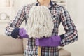 Unrecognizable woman with mop ready to clean floor Royalty Free Stock Photo