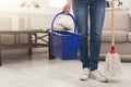 Unrecognizable woman with mop ready to clean floor Royalty Free Stock Photo