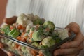 Unrecognizable woman showing Frozen mixed vegetables homemade. Harvesting concept. Stocking up vegetables for winter Royalty Free Stock Photo