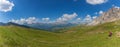 Unrecognizable woman and wonderful summer dolomite panorama