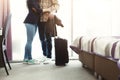 Unrecognizable young couple arrived to hotel room on honeymoon Royalty Free Stock Photo