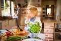 Young father with a toddler boy cooking. Royalty Free Stock Photo