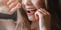 Unrecognizable young girl cleaning teeth with dental floss, close up Royalty Free Stock Photo