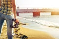 Unrecognizable Young Girl Standing On The Shore And Holding Binoculars, Rear View. Search Scout Travel Concept Royalty Free Stock Photo