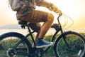 Unrecognizable Young Hipster Man Is Cycling Along The Shore Against The Backdrop Of The Sunset Vacation Holiday Activity Concept Royalty Free Stock Photo