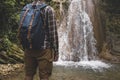 Unrecognizable Young Man Has Reached Destination And Enjoying View Of Waterfall. Journey Hiking Adventure Concept Royalty Free Stock Photo