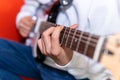 Unrecognizable young man playing electric guitar. Music, instrument education, entertainment, rock s Royalty Free Stock Photo