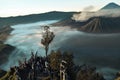 Unrecognized people, beautiful colorful sunrise over Mount Bromo