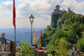 Unrecognized people and Cesta castle tower in San-Marino, Italy