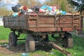 Unrecycled trash. Garbage lies in bulk on a cargo trailer from a tractor. Environmental pollution Royalty Free Stock Photo