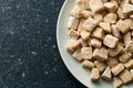 Unrefined cane sugar on plate Royalty Free Stock Photo