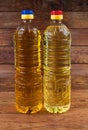 Unrefined cold-pressed and refined sunflower oil in two bottles