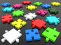 Unrelated pieces of different colored puzzles on a black Royalty Free Stock Photo