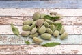 Unripe fresh almonds on vintage table Royalty Free Stock Photo