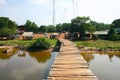 Unsafe bridge across the river in Cambodia Royalty Free Stock Photo