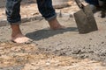 Unsafe construction of Myanmar migrant workers while pouring concrete slab in construction site , Thailand Royalty Free Stock Photo