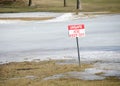 Unsafe Ice - Keep Off Sign Royalty Free Stock Photo