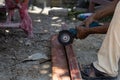 Unsafety working concept, men cutting by grinding machine without PPE