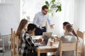 Unsatisfied boss company with employees at boardroom