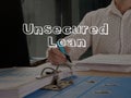 Unsecured Loan is shown on the conceptual business photo Royalty Free Stock Photo