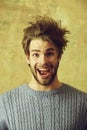 Unshaven handsome happy guy with fashionable hair Royalty Free Stock Photo