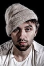 Unshaven man in a knitted hat Royalty Free Stock Photo