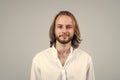 unshaven man with long hair. smiling happy man wear white office shirt. confident and charismatic businessman. cheerful