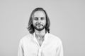 unshaven man with long hair. smiling happy man wear white office shirt. confident and charismatic businessman. cheerful Royalty Free Stock Photo