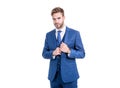 Unshaven office worker wear navy three-piece suit in formal business style, white collar