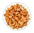 Unshelled cashew nuts in a glass bowl