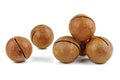 Unshelled macadamia nuts on white background Royalty Free Stock Photo
