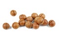 Unshelled macadamia nuts on white Royalty Free Stock Photo
