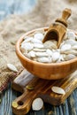 Unshelled pumpkin seeds in a wooden bowl. Royalty Free Stock Photo