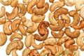 Unshelled roasted cashew nuts food background