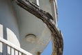 Ugly exposed rebar in decaying concrete porch overhang