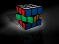 Unsolved rubik's cube on black Royalty Free Stock Photo