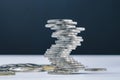 Unstable closed to collapse stack of coins tower , uncertainty o